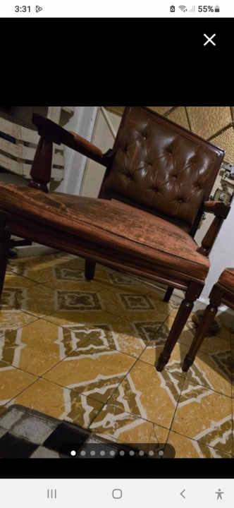 Par de sillones de caoba marca PACO SOBRINO