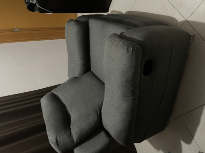 Sillón reclinable de tela gris 